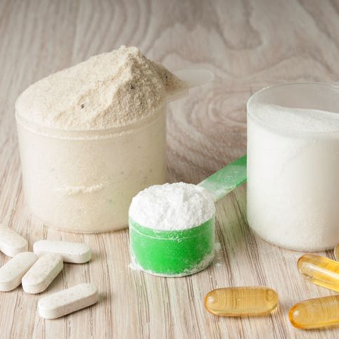 scoop-of-protein,-bcaa-and-creatine,-omega3-in-pills-543978028_728x483