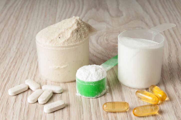scoop-of-protein,-bcaa-and-creatine,-omega3-in-pills-543978028_728x483